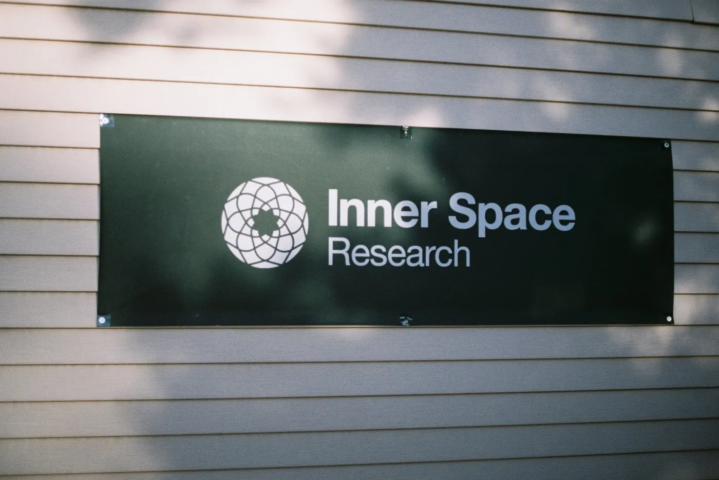 The Inner Space Research sign on the office in Orem